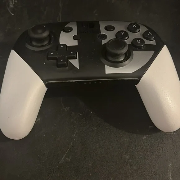 Nintendo Switch Super Smash Bros. Edition: Gray w/ pro controller and steelbook.